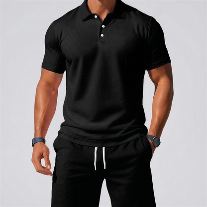 Zomerse tweedelige set voor heren, bestaande uit een polo en een korte broek